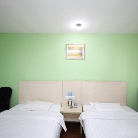 Yixin Business Hotel Гуанчжоу Экстерьер фото