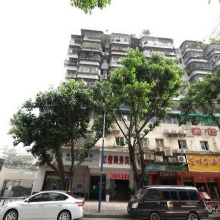 Yixin Business Hotel Гуанчжоу Экстерьер фото