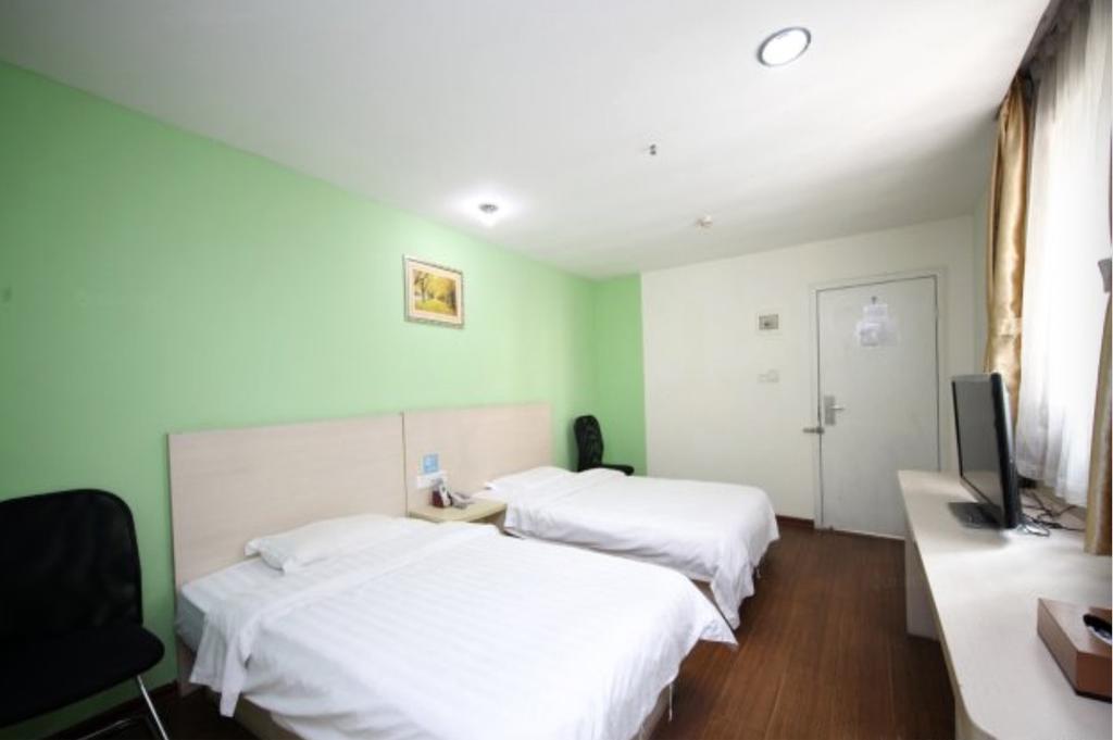 Yixin Business Hotel Гуанчжоу Экстерьер фото