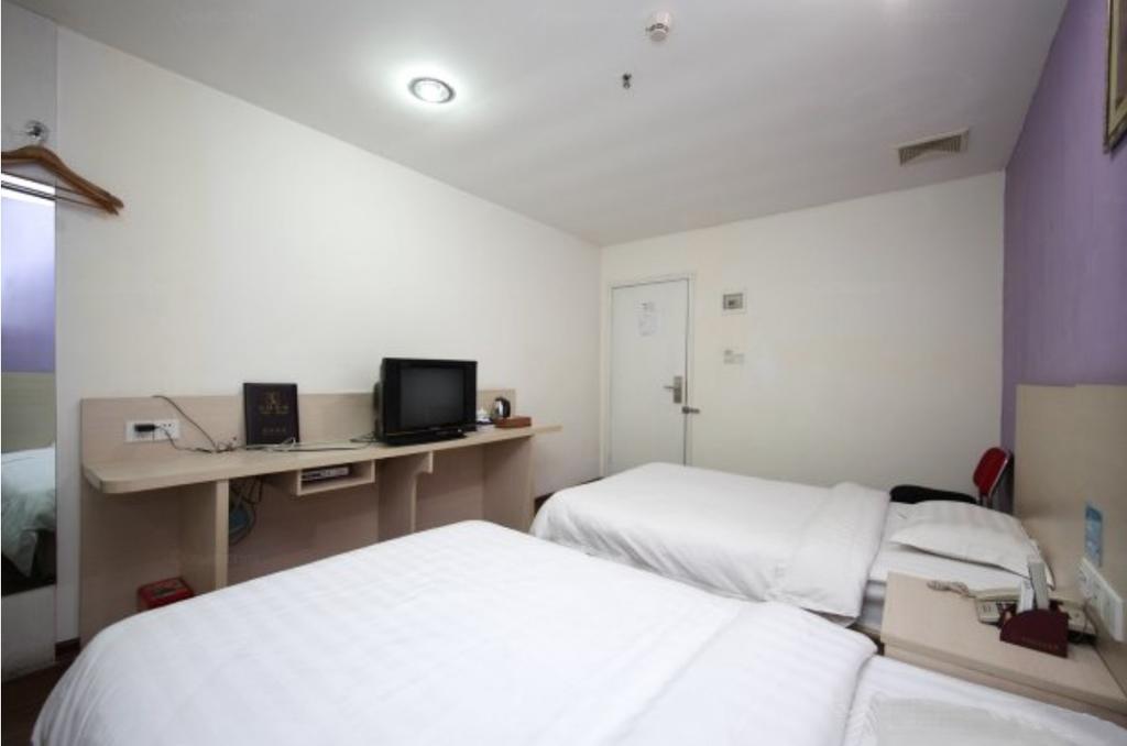 Yixin Business Hotel Гуанчжоу Экстерьер фото