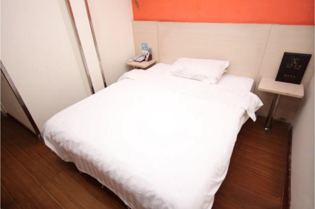 Yixin Business Hotel Гуанчжоу Экстерьер фото