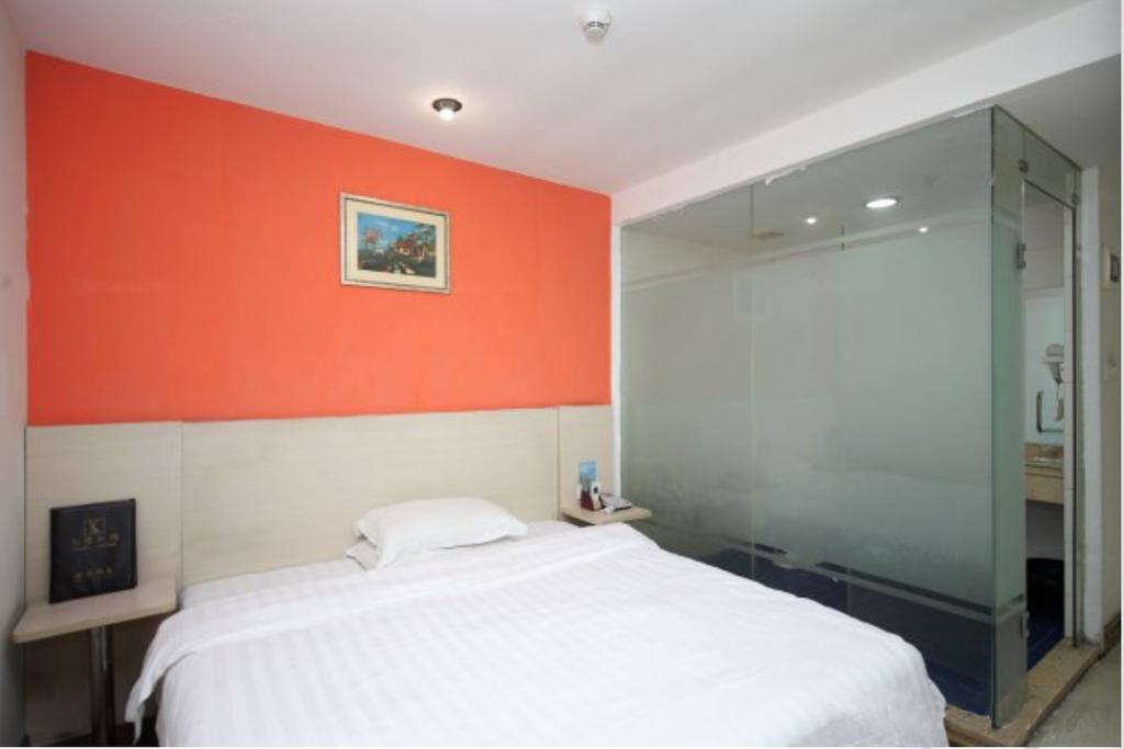 Yixin Business Hotel Гуанчжоу Экстерьер фото