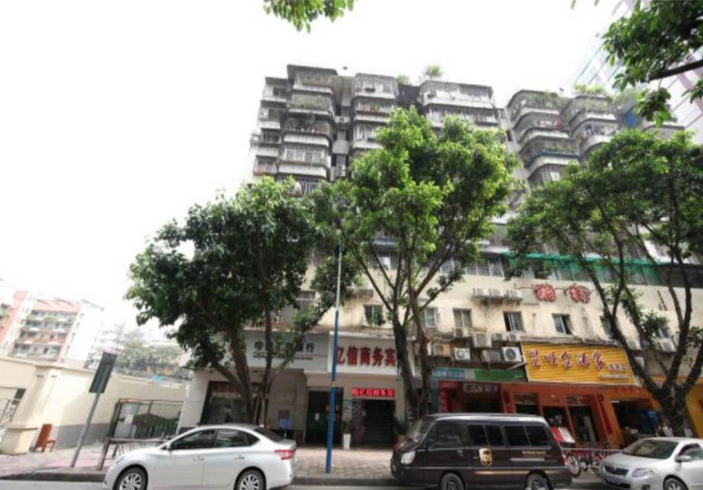 Yixin Business Hotel Гуанчжоу Экстерьер фото