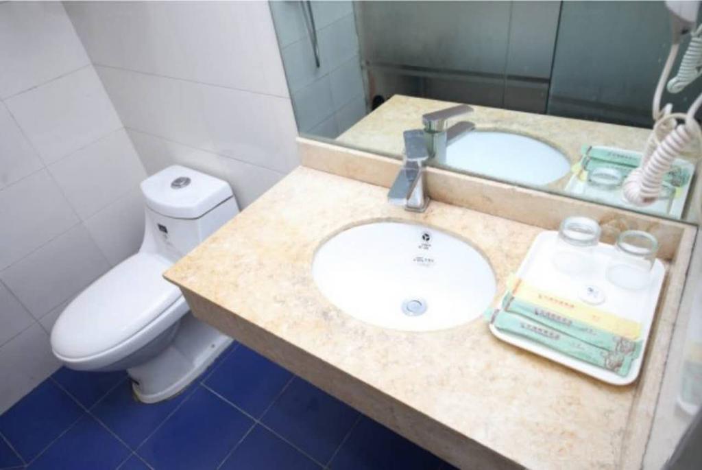 Yixin Business Hotel Гуанчжоу Экстерьер фото