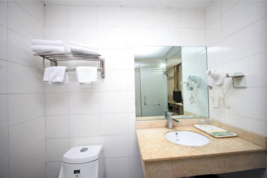 Yixin Business Hotel Гуанчжоу Экстерьер фото