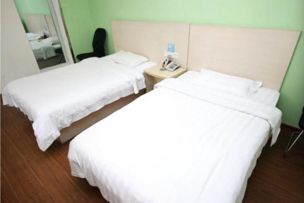 Yixin Business Hotel Гуанчжоу Экстерьер фото
