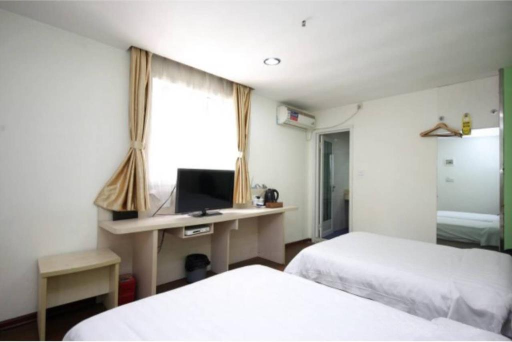 Yixin Business Hotel Гуанчжоу Экстерьер фото