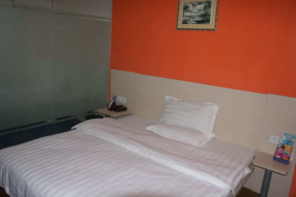 Yixin Business Hotel Гуанчжоу Экстерьер фото