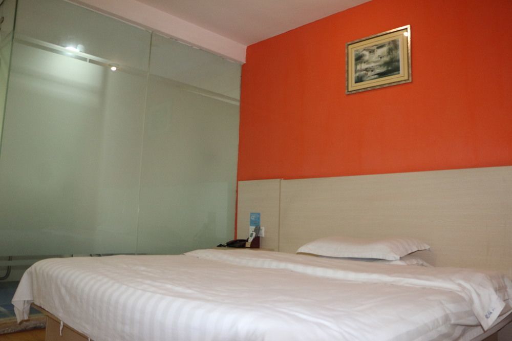 Yixin Business Hotel Гуанчжоу Экстерьер фото