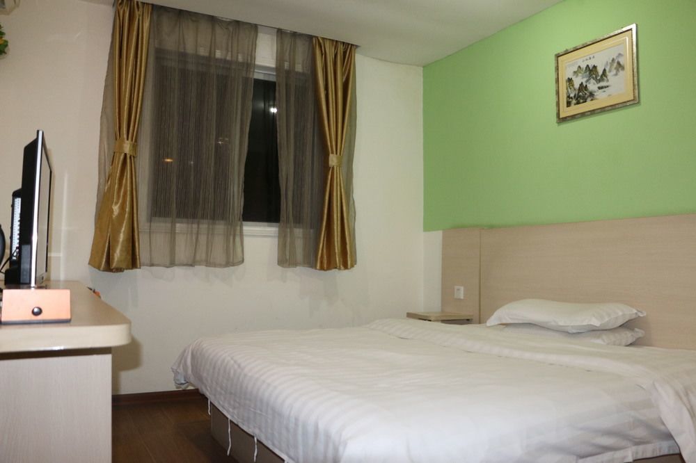 Yixin Business Hotel Гуанчжоу Экстерьер фото