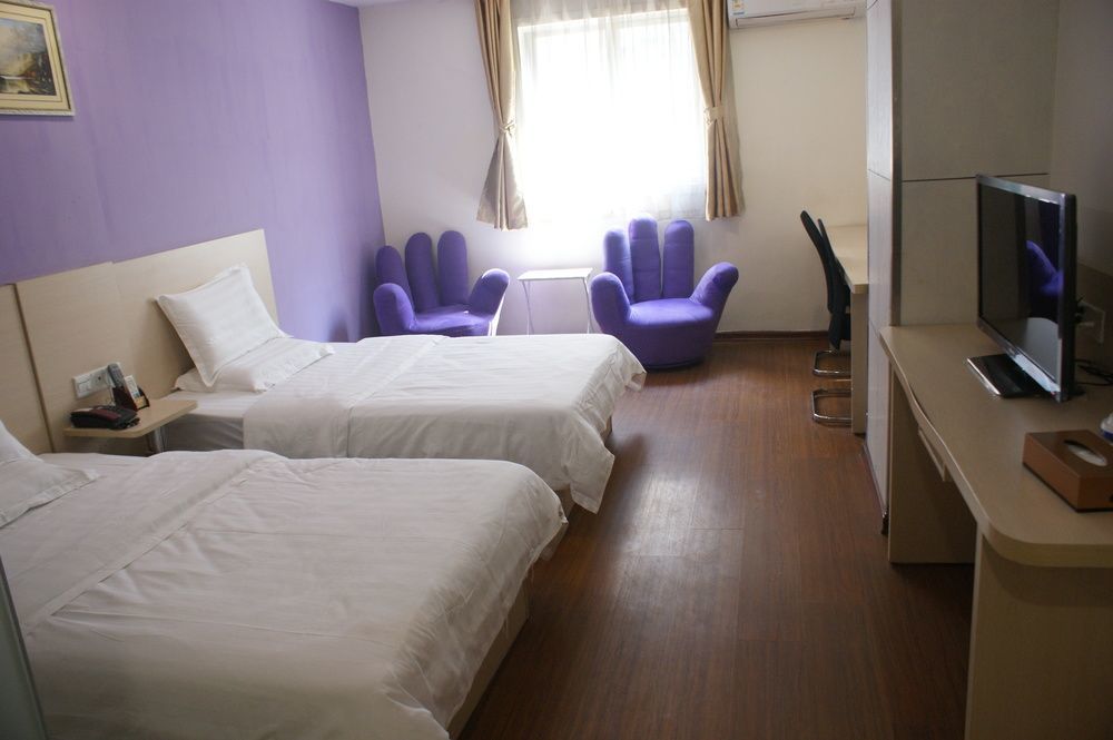 Yixin Business Hotel Гуанчжоу Экстерьер фото