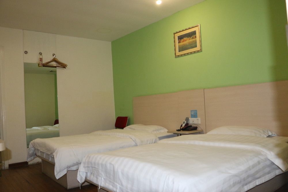 Yixin Business Hotel Гуанчжоу Экстерьер фото