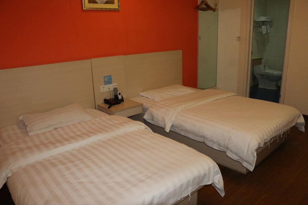 Yixin Business Hotel Гуанчжоу Экстерьер фото