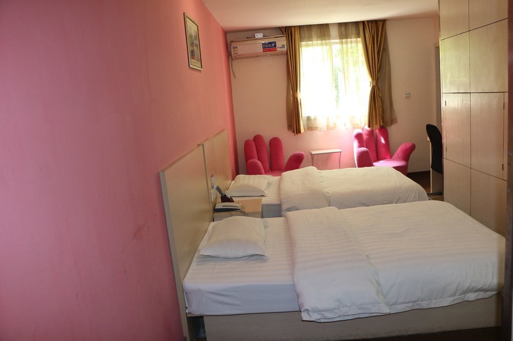 Yixin Business Hotel Гуанчжоу Экстерьер фото