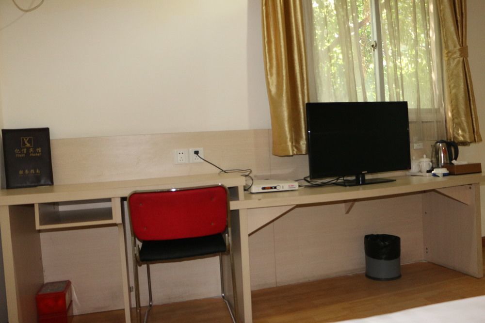 Yixin Business Hotel Гуанчжоу Экстерьер фото